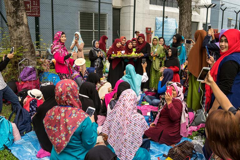 A number of migrant workers gathering